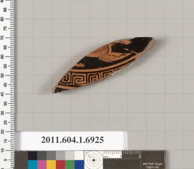 Terracotta fragment of a kylix (drinking cup)