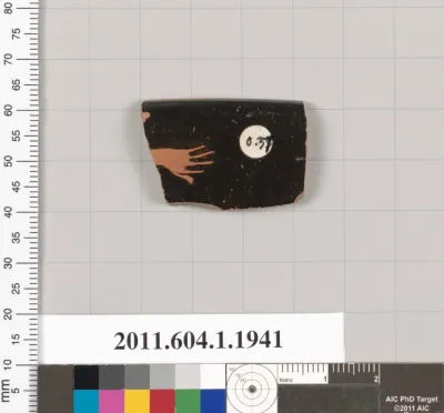 Terracotta rim fragment of a kylix (drinking cup)