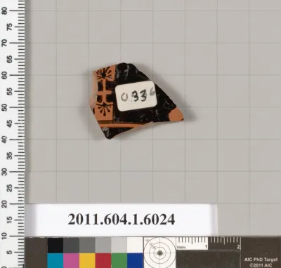 Terracotta fragment of a kylix (drinking cup)