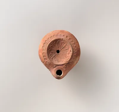 Terracotta oil lamp