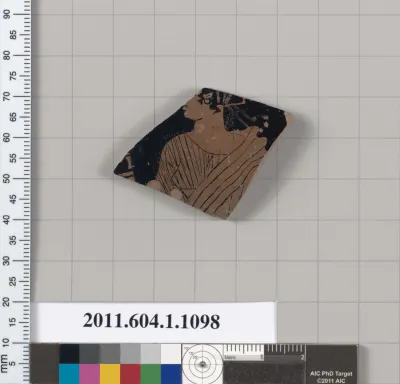 Terracotta fragment of a kylix (drinking cup)