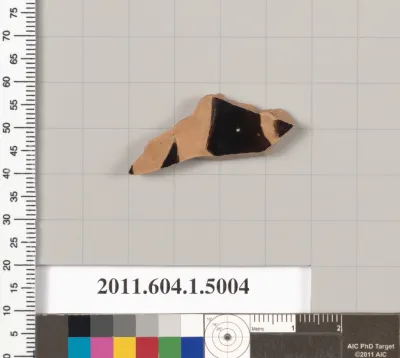 Terracotta fragment of a kylix (drinking cup)