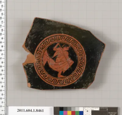 Terracotta fragment of a stemless kylix (drinking cup)