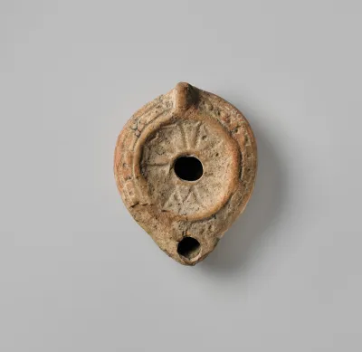 Terracotta oil lamp