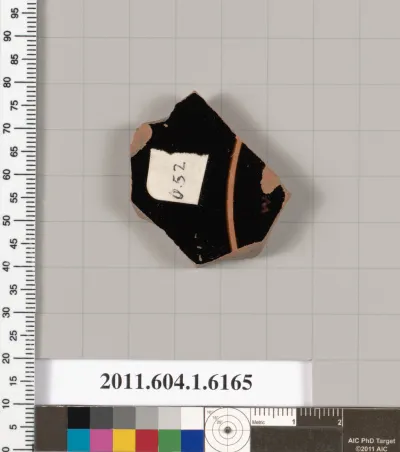 Terracotta fragment of a kylix (drinking cup)