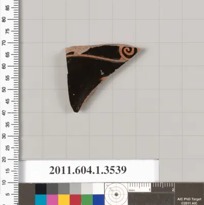 Terracotta fragment of a kylix (drinking cup)