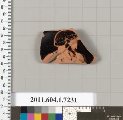 Terracotta fragment of a kylix (drinking cup)