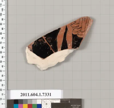 Terracotta fragment of a kylix (drinking cup)