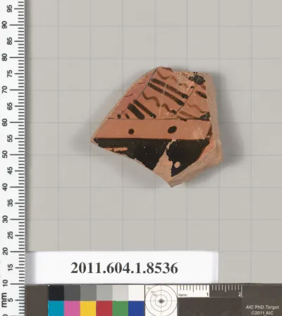 Terracotta fragment of a stemless kylix (drinking cup)