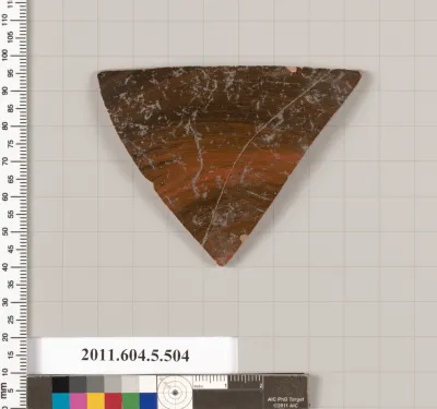 Terracotta fragment of a kylix (drinking cup)
