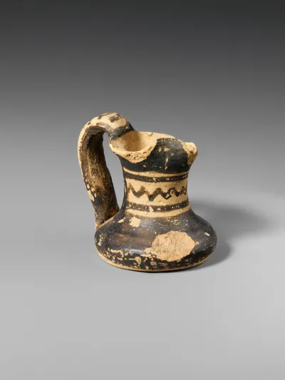 Miniature terracotta jug