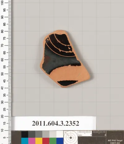 Terracotta fragment of a kylix: eye-cup (drinking cup)