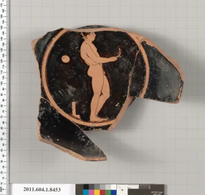 Terracotta fragment of a stemless kylix (drinking cup)
