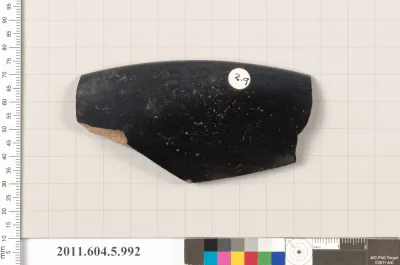 Terracotta rim fragment of a kylix (drinking cup)