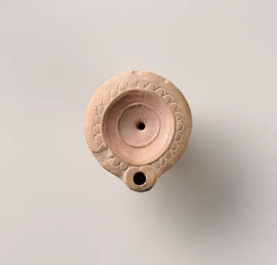 Terracotta oil lamp