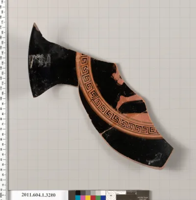 Terracotta fragment of a kylix (drinking cup)