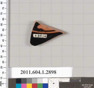 Terracotta fragment of a kylix (drinking cup)