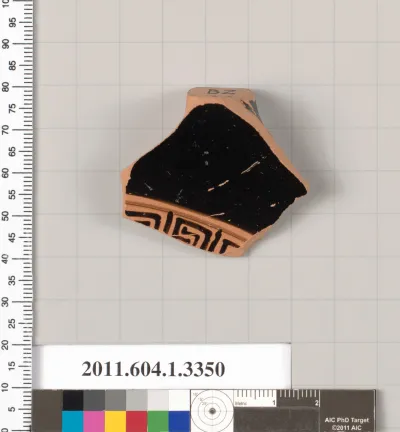 Terracotta fragment of a kylix (drinking cup)