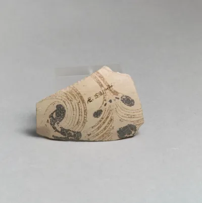 Terracotta vessel fragment with floral design
