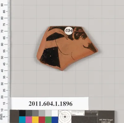 Terracotta rim fragment of a kylix (drinking cup)