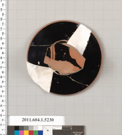 Terracotta fragment of a kylix (drinking cup)