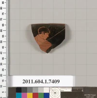 Terracotta rim fragment of a kylix (drinking cup)