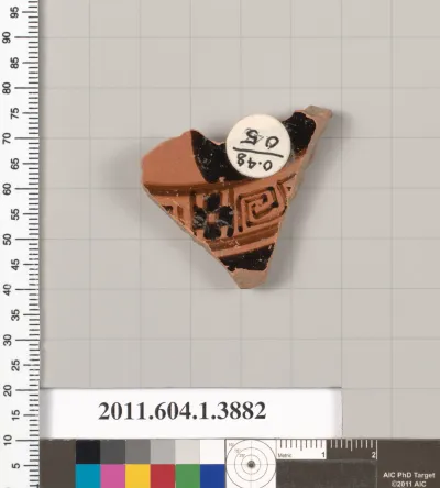 Terracotta fragment of a kylix (drinking cup)