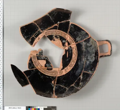Terracotta fragment of a kylix (drinking cup)
