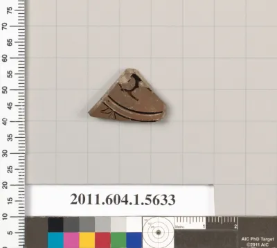 Terracotta fragment of a kylix (drinking cup)