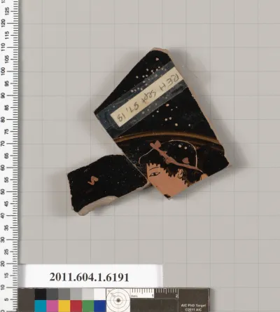 Terracotta fragment of a kylix (drinking cup)