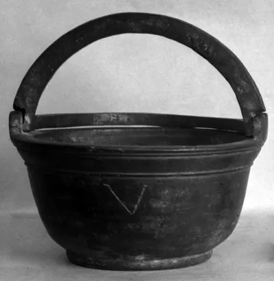 Eimerförmiges Gewicht mit Marke V