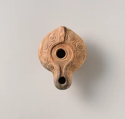 Terracotta oil lamp