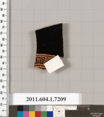 Terracotta fragment of a kylix (drinking cup)