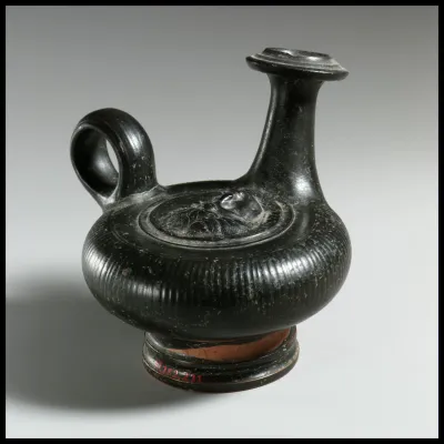 Terracotta guttus (flask with handle and vertical spout)