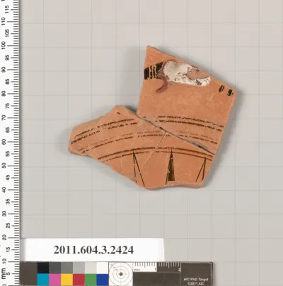 Terracotta fragment of a kylix: eye-cup (drinking cup)