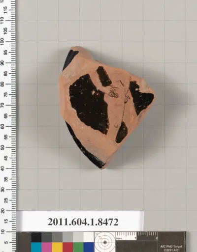 Terracotta fragment of a stemless kylix (drinking cup)