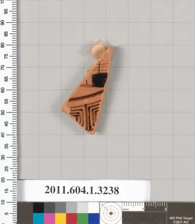 Terracotta fragment of a kylix (drinking cup)