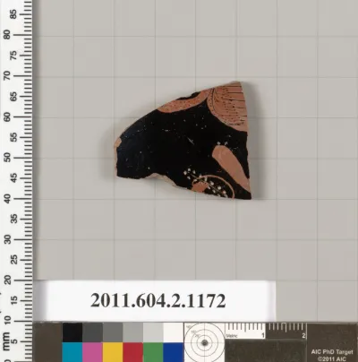 Terracotta fragment of a lekanis lid (covered dish)