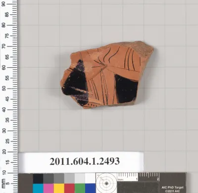 Terracotta fragment of a kylix (drinking cup)