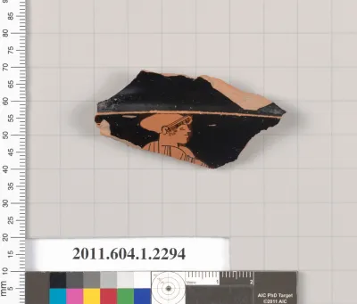 Terracotta fragment of a kylix (drinking cup)