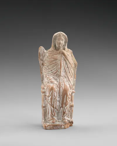 Terracotta statuette of a seated goddess