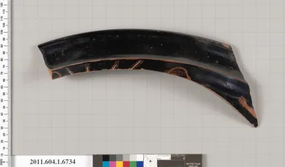 Terracotta rim fragment of a kylix (drinking cup)