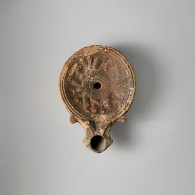 Terracotta oil lamp
