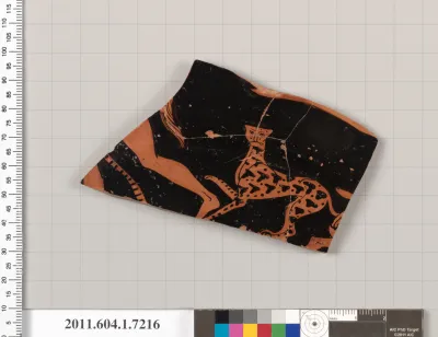 Terracotta fragment of a kylix (drinking cup)