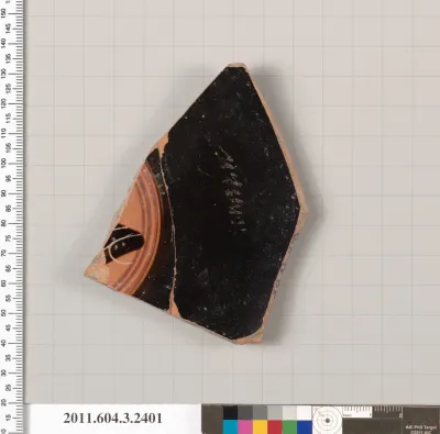 Terracotta fragment of a kylix: eye-cup (drinking cup)