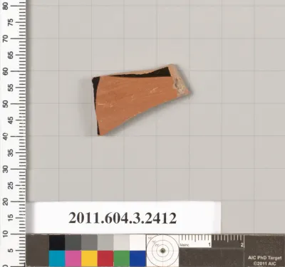 Terracotta fragment of a kylix: eye-cup (drinking cup)