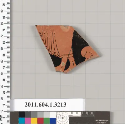 Terracotta fragment of a kylix (drinking cup)