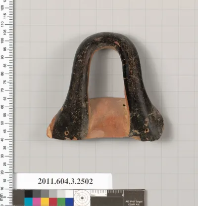 Terracotta fragment of a kylix (drinking cup)