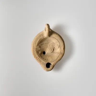 Terracotta oil lamp