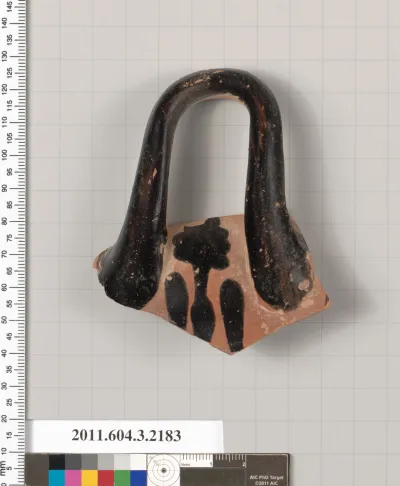 Terracotta fragment of a kylix (drinking cup)